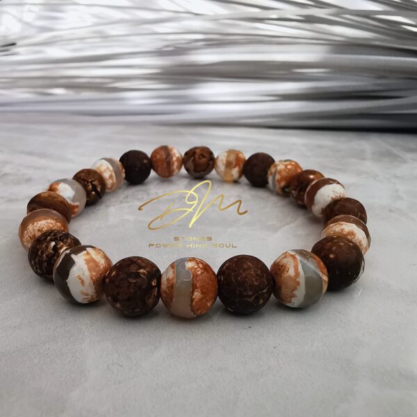 Tibetas Dzi Ahāta aproce (bruns ar baltu)